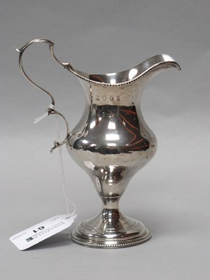 Lot 61 - A Georgian Hallmarked Silver Cream Jug, (marks...