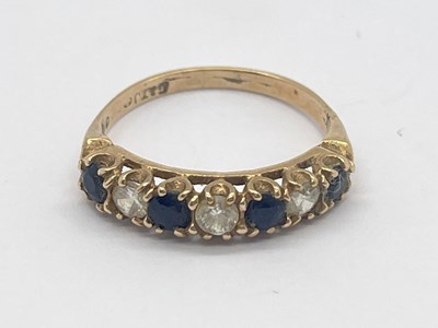 Lot 84 - A Seven Stone Dress Ring, the alternate...