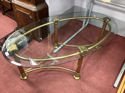 Lot 1551 - Glass Oval Topped Coffee Table, on brass...