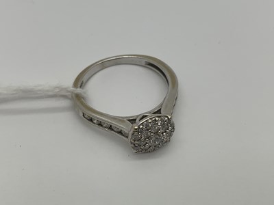 Lot 528 - A Modern 18ct White Gold Diamond Cluster Ring,...