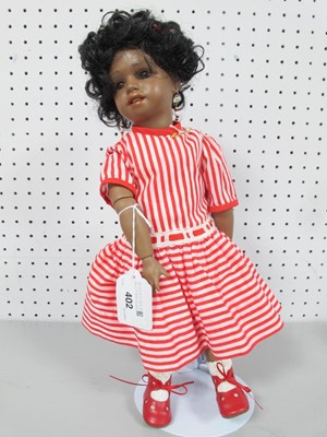 Lot 402 - A Modern Reissue Open Mouthed Bisque Doll,...