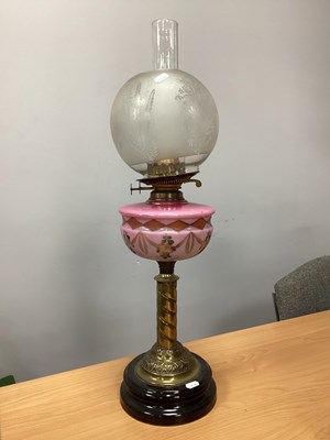 Lot 1413 - XIX Century Brass Ol Lamp, with pink painted...