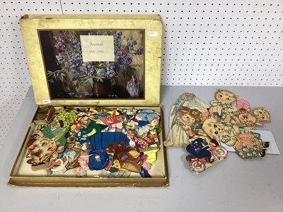 Lot 303 - Circa XX Century Cut Out Scraps, one box.