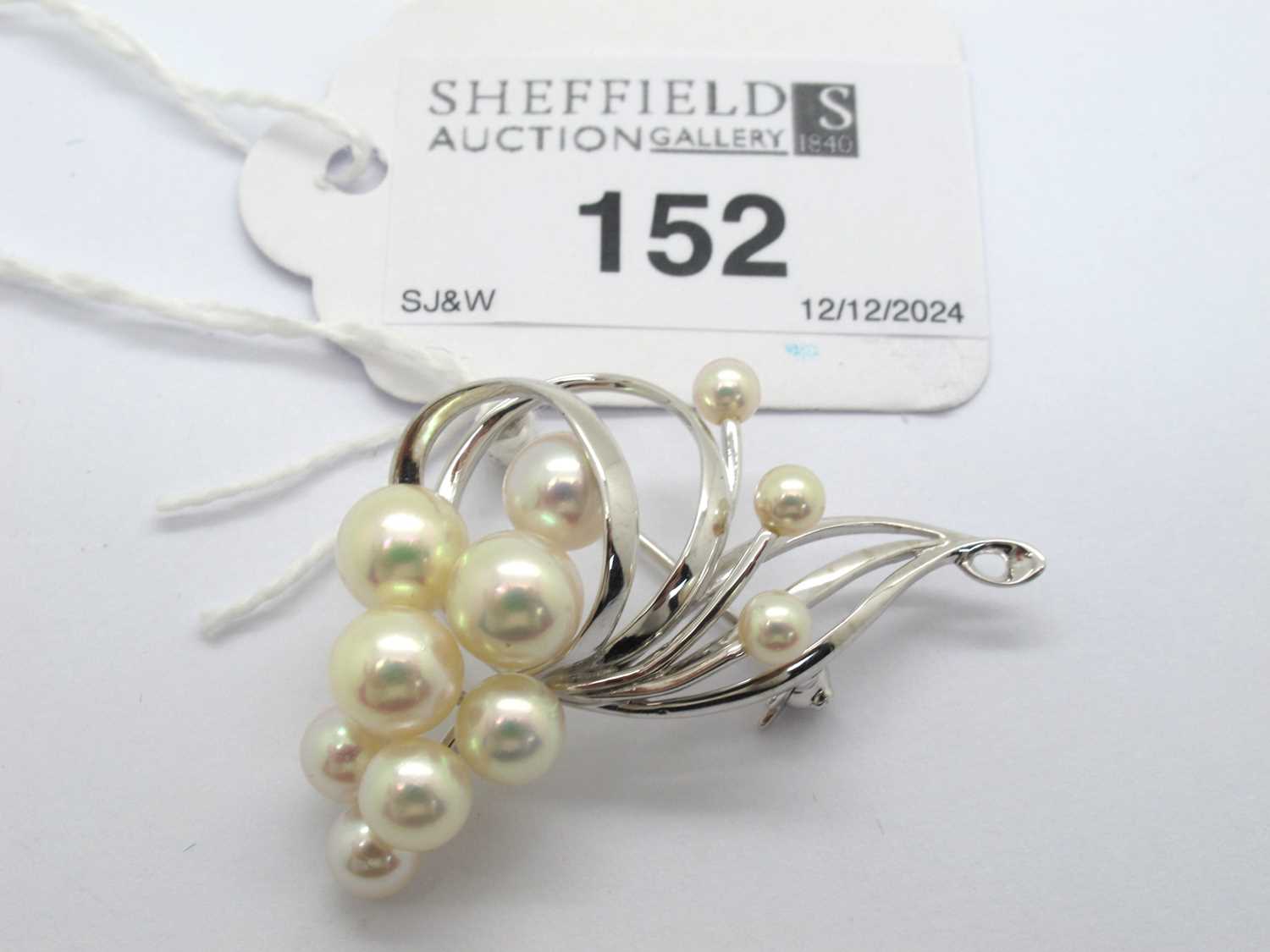 Lot 152 - Mikimoto; A Pearl Set Openwork Brooch, of...
