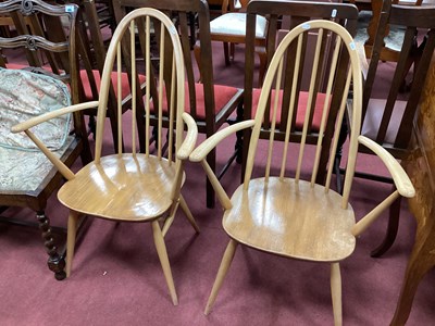 Lot 1566 - Ercol, A pair of open armchairs, with a hooped...