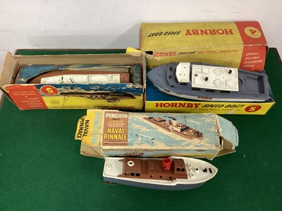 Lot 620 - Three Plastic Model Clockwork Boats by Hornby,...