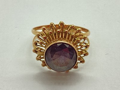 Lot 22 - A Stone Set Abstract Style Ring, the circular...