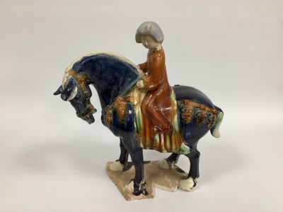 Lot 1150 - A Tang Style Horse and Rider, of typical form...