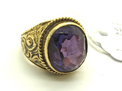 Lot 232 - A Single Stone College Style Ring, the colour...