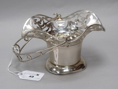 Lot 49 - An Edwardian Hallmarked Silver Swing Handled...