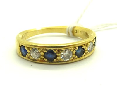 Lot 229 - A Stone Set Half Eternity Style Ring,...