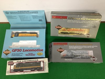 Lot 750 - Three HO Gauge U.S.A Outline Boxed Diesel...