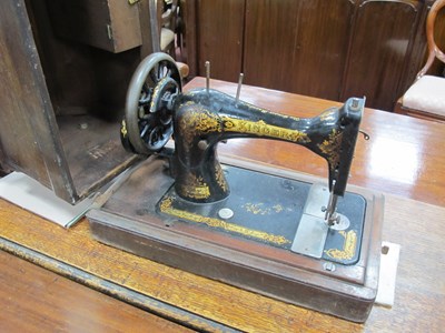 Lot 1638 - A Late XIX Century Singer Sewing Machine, in...