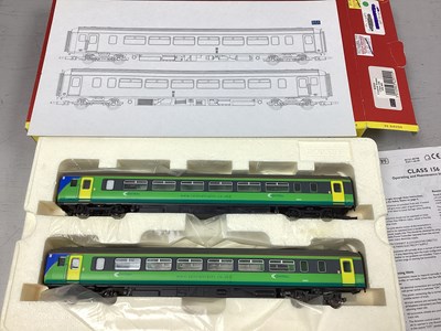 Lot 528 - A Hornby OO Gauge Class 156 DMU, in central...