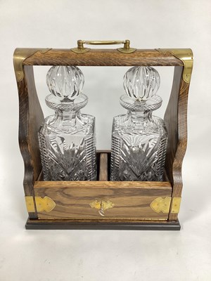 Lot 1283 - A Reproduction Oak Cased Tantalus, with brass...