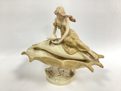 Lot 1093 - A Royal Dux Pottery Model of a Lady Seated on...