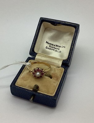 Lot 514 - An Antique Pearl and Ruby Cluster Ring, with...