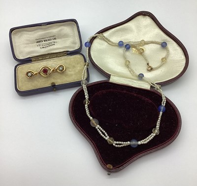 Lot 444 - A Pearl Set Bar Brooch, of twisted design, in...