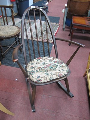 Lot 1526 - An Oak Ercol Rocking Chair, with a hooped back...