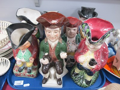 Lot 1154 - Ralph Wood Replica Toby Jug, and six others,...