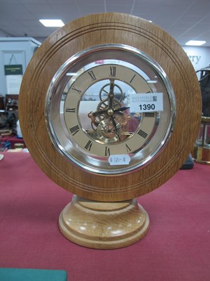 Lot 1390 - A Circular Oak Framed Skeleton Clock, on a...