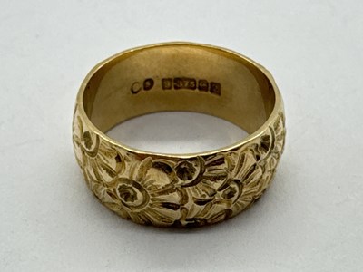 Lot 97 - A 9ct Gold Chunky Band Ring, with allover...