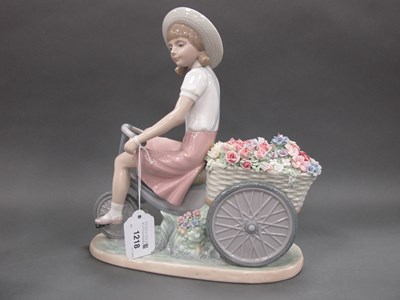 Lot 1218 - Lladro Figurine of Girl Cycling with Basket of...