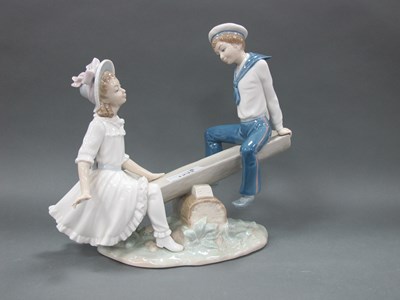 Lot 1232 - Lladro Figurine of Seasaw Couple, The Boy in...