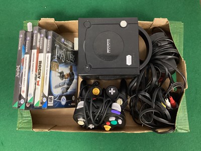 Lot 729 - A Nintendo Game Cube Console, two hand...