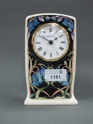 Lot 1161 - A Moorcroft Pottery Clock, decorated in the...