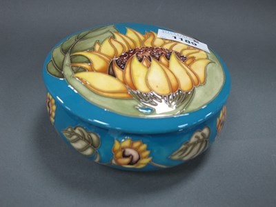 Lot 1189 - A Moorcroft Pottery Circular Lidded Pot,...