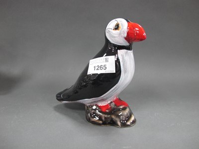 Lot 1265 - An Anita Harris Puffin Figure, in re-active...