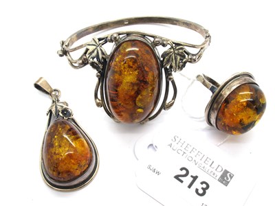 Lot 213 - A Hallmarked Silver Amber Coloured Bangle, NHJ,...