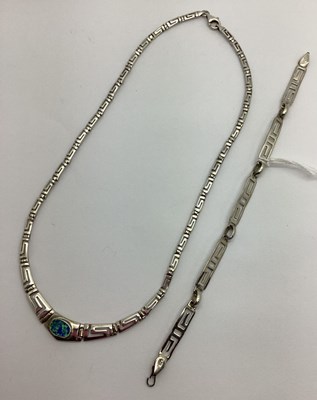 Lot 455 - A Modern Greek Key Design Graduated Necklace,...