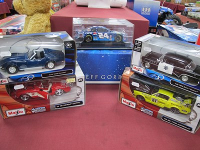 Lot 522 - Five 1:24th scale diecast model cars by Revell,...