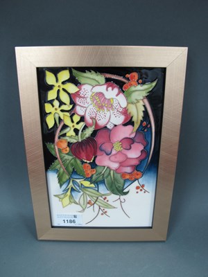 Lot 1186 - A Moorcroft Pottery Plaque, decorated in the...