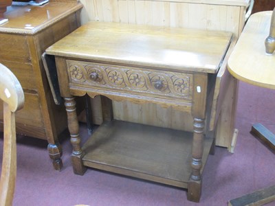 Lot 1504 - Oak Side Table, with end fall flaps, carving...