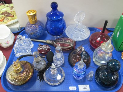 Lot 1196 - A collection of glass scent bottles and...