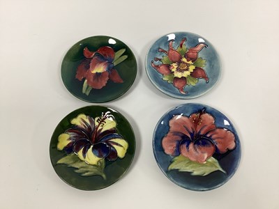 Lot 1112 - Four Various Moorcroft Pottery Circular Dishes,...