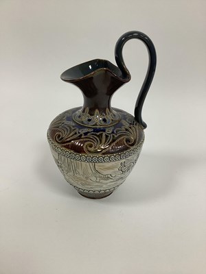 Lot 1069 - A Doulton Lambeth Stoneware Ewer, designed by...