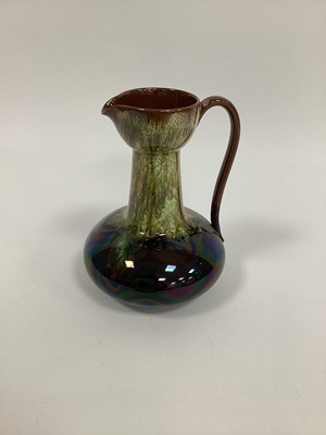 Lot 1087 - A Linthorpe Pottery Ewer, of compressed...