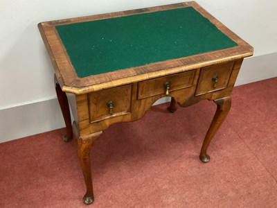 Lot 1519 - An AXIII Century and Later Walnut Lowboy, the...