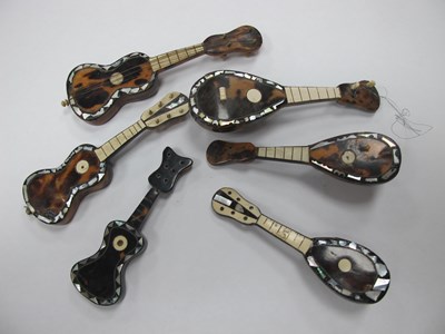 Lot 1273 - Miniature Tortoiseshell Mandolins/Guitars,...