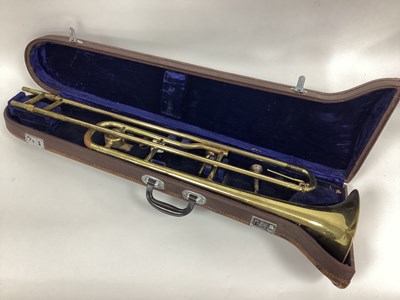 Lot 1392 - A Chinese 'Lark' Trumpet, in brass finish,...