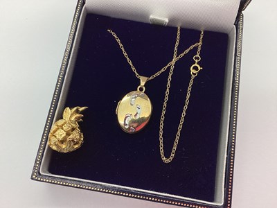 Lot 75 - A 9ct Gold Motif Locket Pendant, with white...