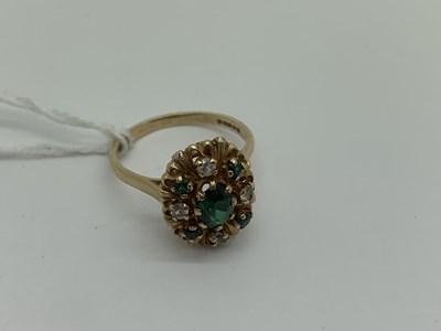 Lot 214 - A 9ct Gold Cluster Style Dress Ring, oval claw...