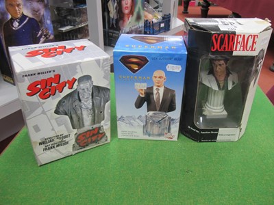 Lot 749 - Three Boxed Film/Comic Themed Porcelain/Resin...