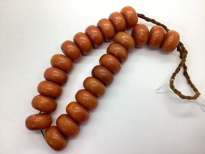 Lot 168 - A Traditional Style Single Strand Beaded...