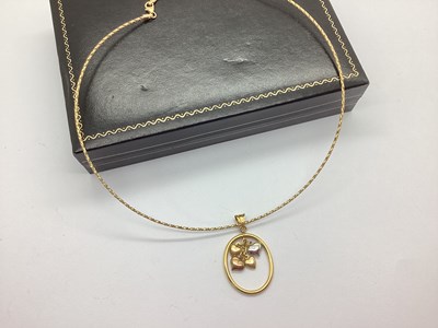 Lot 74 - A 9ct Gold Heart Drop Pendant, the openwork...