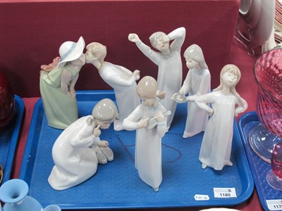 Lot 1180 - Lladro figurines Boy Yawning, Girl and...